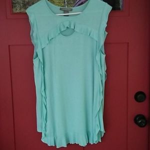 Sleeveless top with ruffles.